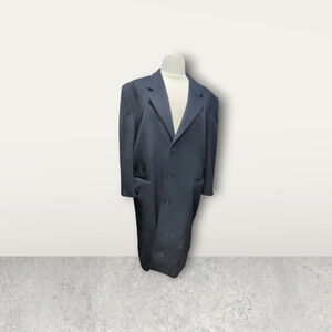 Black wool trench coat with lining, made in Yugoslavia.